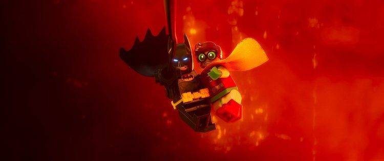 Batman y el joven Robin luchando contra el mal